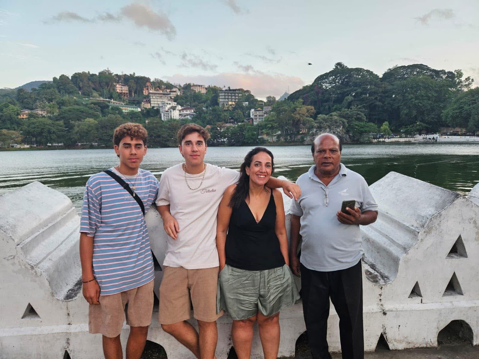 European family with their Sri Lankan host after an evening meal